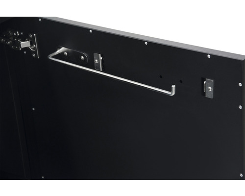 Binnenkant van een zwarte kast met haken