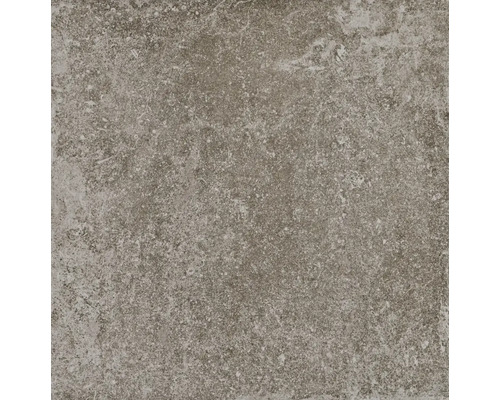 Close-up van een vloertegel met gestructureerde oppervlakken