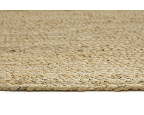 Close-up van een gevlochten vloerkleed van natuurlijke vezels