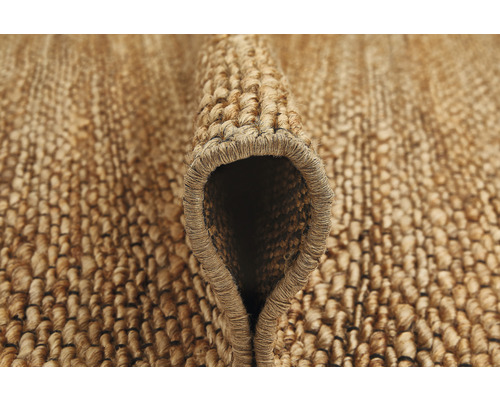 Detailopname van een tapijt van natuurlijke vezels