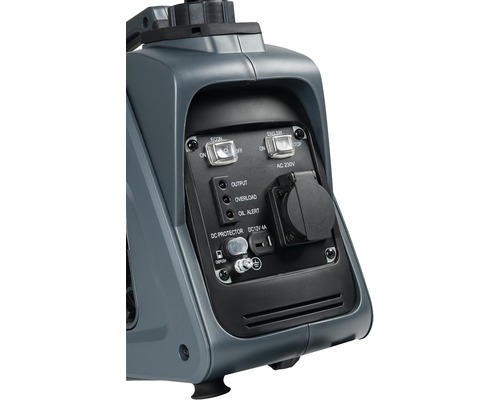 Detail van een stroomgenerator met schakelaars, stopcontact en indicatoren.