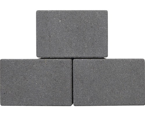 Drie grijze betonklinkers