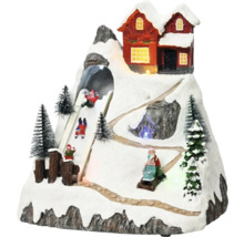 Decoratief winterlandschap met huis, rodelbaan en besneeuwde bomen