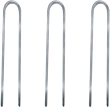 Drie zilverkleurige metalen haringen