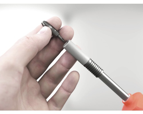 Hand zet schroefbit in bithouder