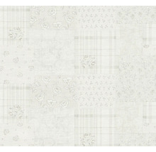 Behang met patchwork design en bloemmotief