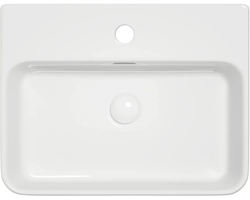 Bovenaanzicht van een witte wastafel