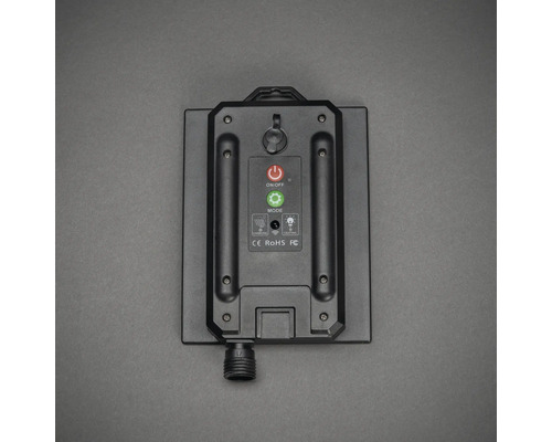 Achterkant van een solarlamp met aan/uit-schakelaar en modusknop