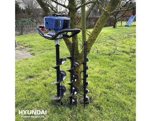 Grondboor met motor en twee boren voor het boren van gaten in de grond