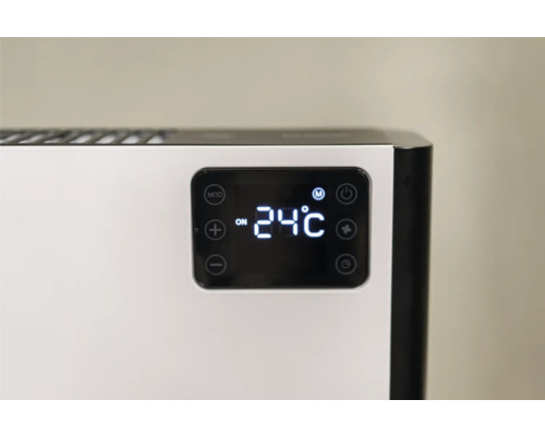 Detail van een verwarming met digitale temperatuurweergave.