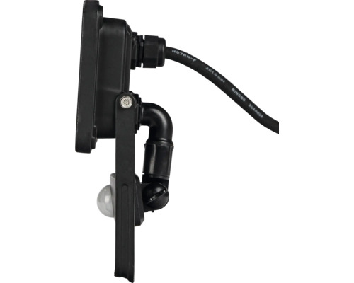 Detail van een zwarte buitenlamp met bewegingsmelder