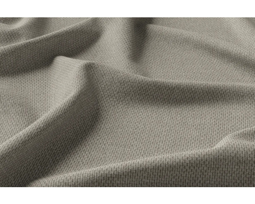 Close-up van beige geweven stof met plooien