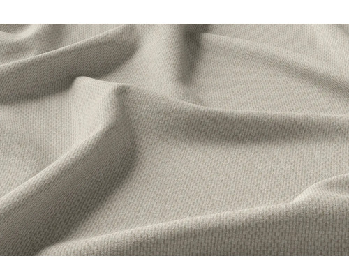 Close-up van beige meubelstof met fijne textuur