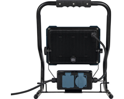 Achterkant van een bouwlamp met stekkerdoos en draagframe