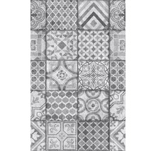Tegelpatroon met diverse geometrische en bloemmotieven