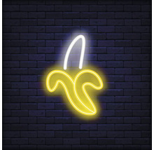 Neonlamp in de vorm van een banaan voor een bakstenen muur