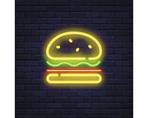 Neonreclame van een burger tegen een bakstenen muur