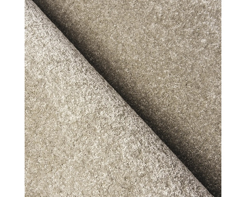 Close-up van een beige tapijt met textuur