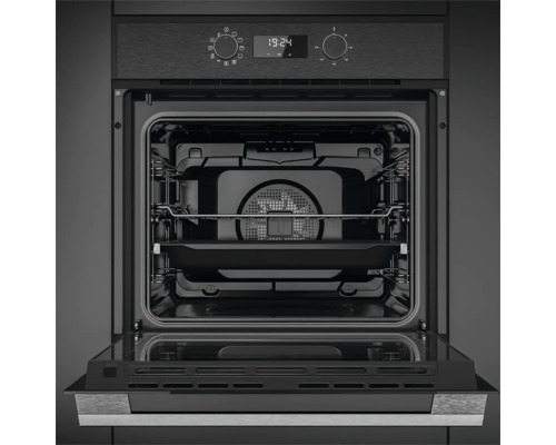 Geopende inbouwoven met binnenverlichting en draaiknoppen