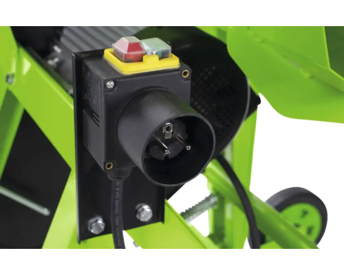 Detail van de stroomaansluiting en bedieningselementen van een bouwmachine