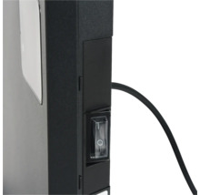 Detail van een radiator met een aan-uitschakelaar