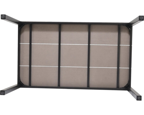 Onderaanzicht van een tafel met metalen frame en stoffen bekleding