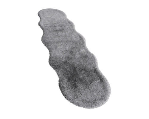 Grijze vloerkleed in de vorm van een schapenvacht