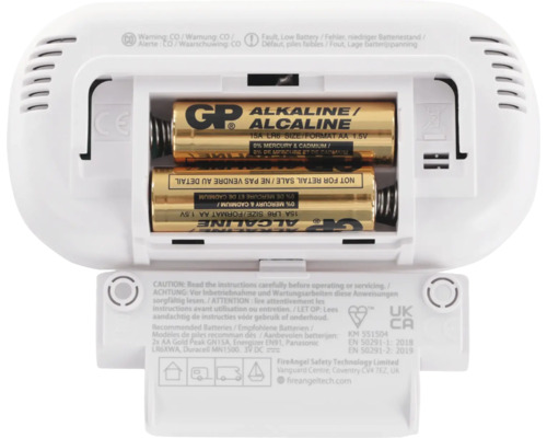 Geopende koolmonoxidemelder met geplaatste batterijen