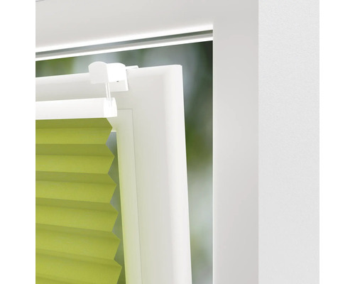 Detailaanzicht van een plisségordijn op het raam