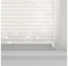 Plisségordijn met bladmotief op het raam