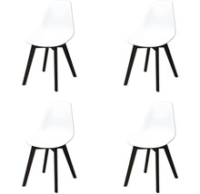 Vier witte stoelen met zwarte poten