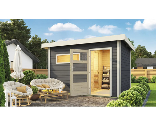 Modern tuinhuis met open deur en sauna in de tuin
