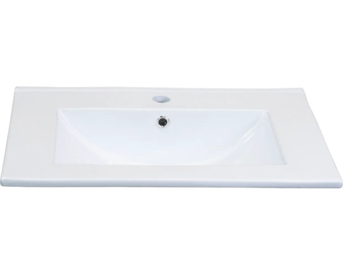 Wastafel van keramiek met kraangat en overloop