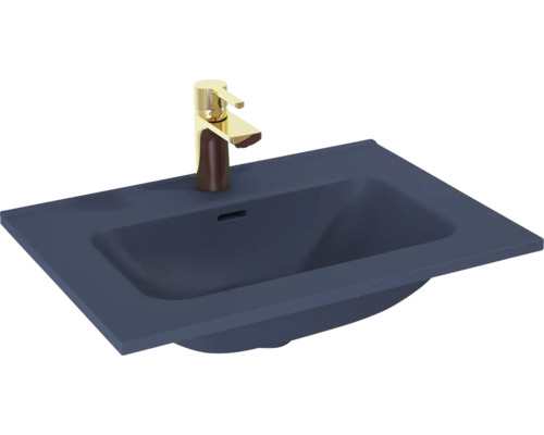 Wastafel van sanitair keramiek met kraan