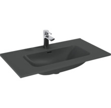 Rechthoekige wastafel van gegoten mineraal met kraan