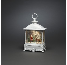 Decoratieve lantaarn met kerstman, kerstboom en hert binnenin