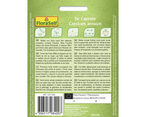 Cayennepeper van de soort Capsicum annuum, vormt dunne, scherp smakende vruchten die van groen naar rood rijpen.