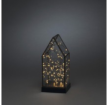 Decoratieve glazen lantaarn in de vorm van een huis met geïntegreerde verlichting
