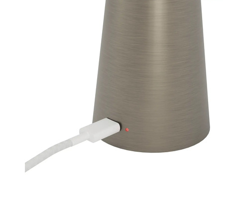 Close-up van een tafellamp met oplaadkabel