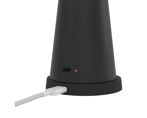 Detailweergave van een zwarte lamp met laadaansluiting en bijbehorende kabel.