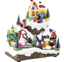Decoratief winterlandschap met huizen, bomen en figuren