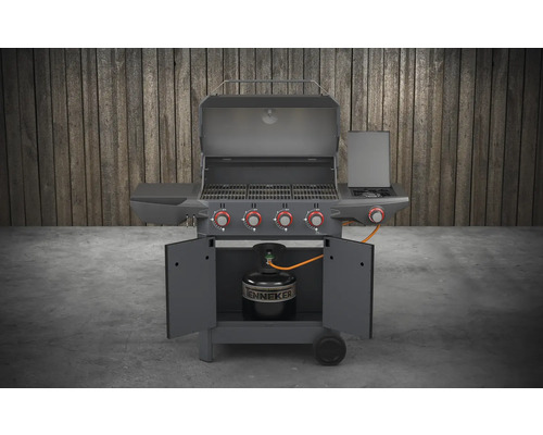 Gasbarbecue met open kap en gasfles in de onderkast