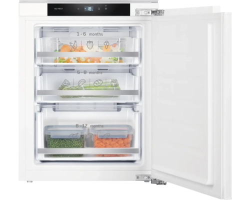 Geopende diepvriezer met diepvrieslades voor voedselopslag