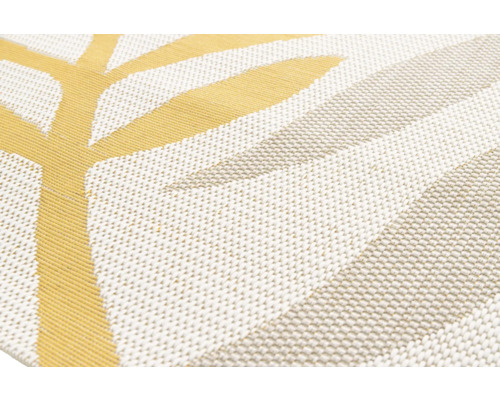 Detailopname van een tapijt met abstract bladmotief