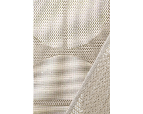 Detailopname van een geweven tapijt met motief