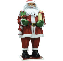Decoratieve kerstmanfiguur met cadeau en maretak