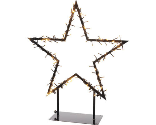 Stervormige kerstdecoratie met lichten op een standaard