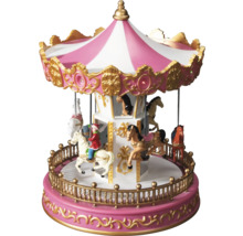 Decoratieve speeldoos met carrouseldesign en paardenfiguren.