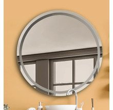 Ronde spiegel met frame in badkamer