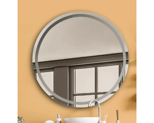 Ronde spiegel met frame in badkamer